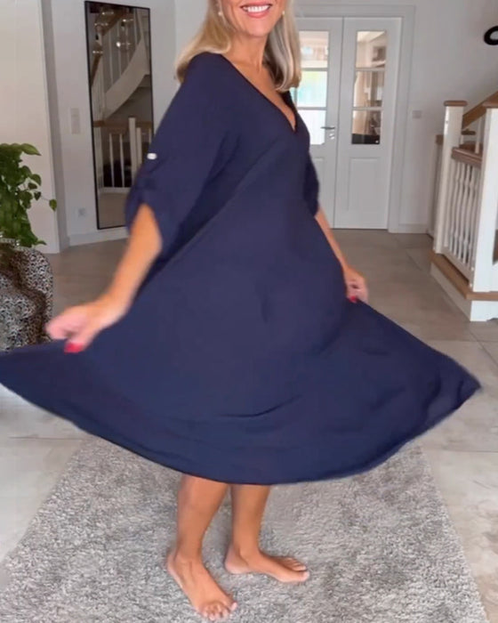 Enfärgad Klänning och v-ringad