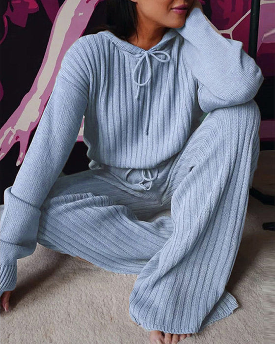 Lös långärmad kostym med huva