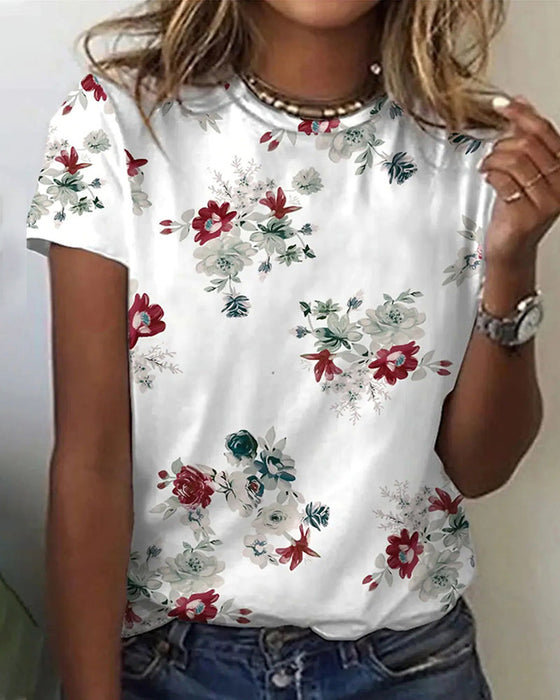T-shirt i blommönster med rund hals och kort ärm