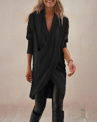 Enfärgad topp med korsdesign