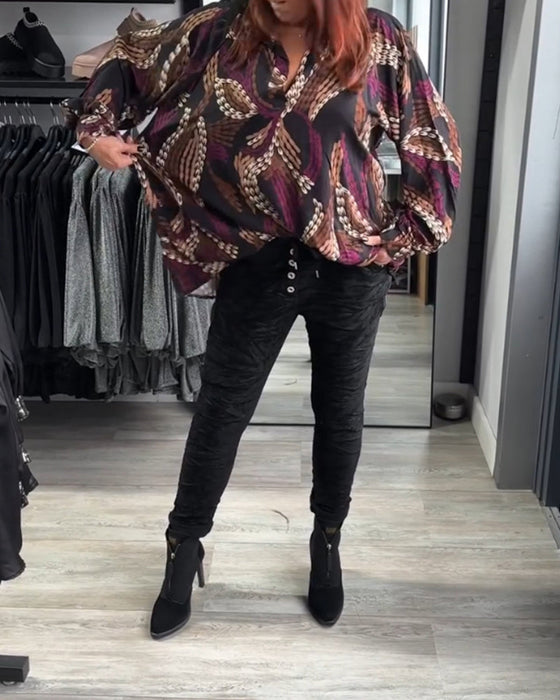 Blus med V-ringning och tryck