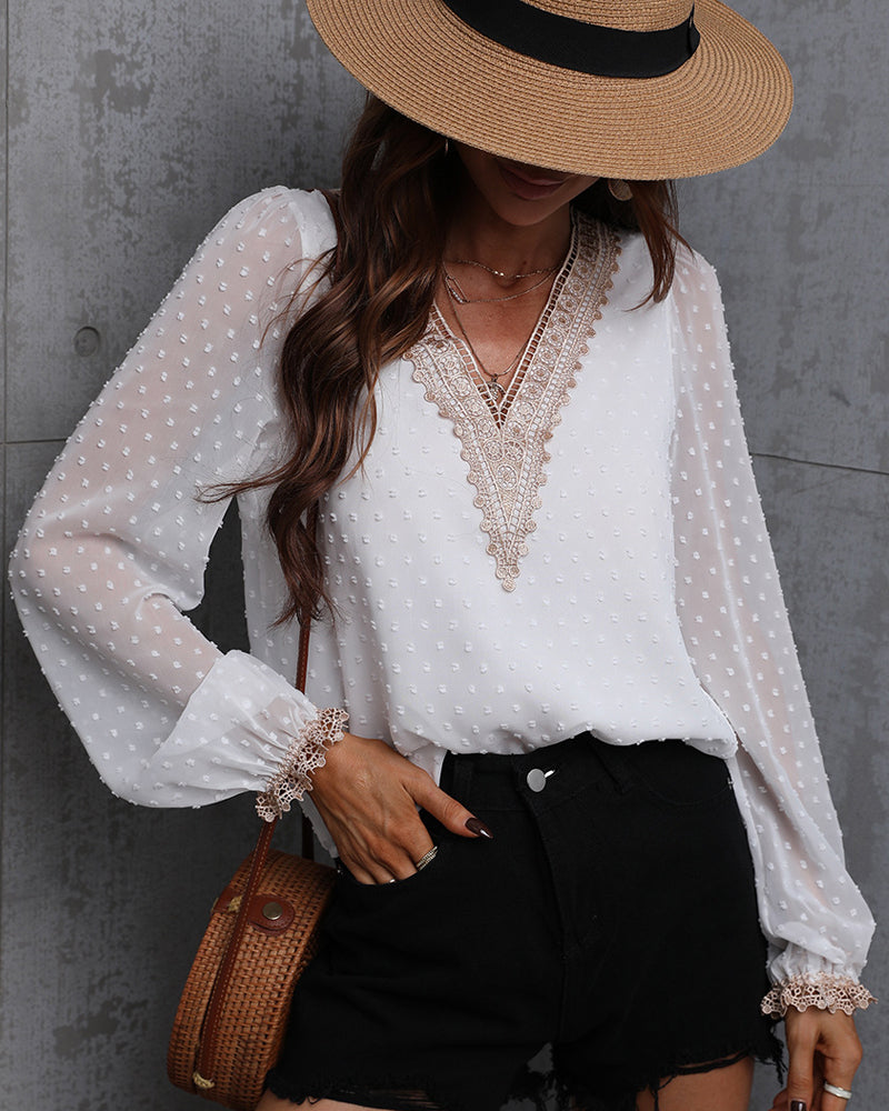 Enfärgad långärmad blusar med spets