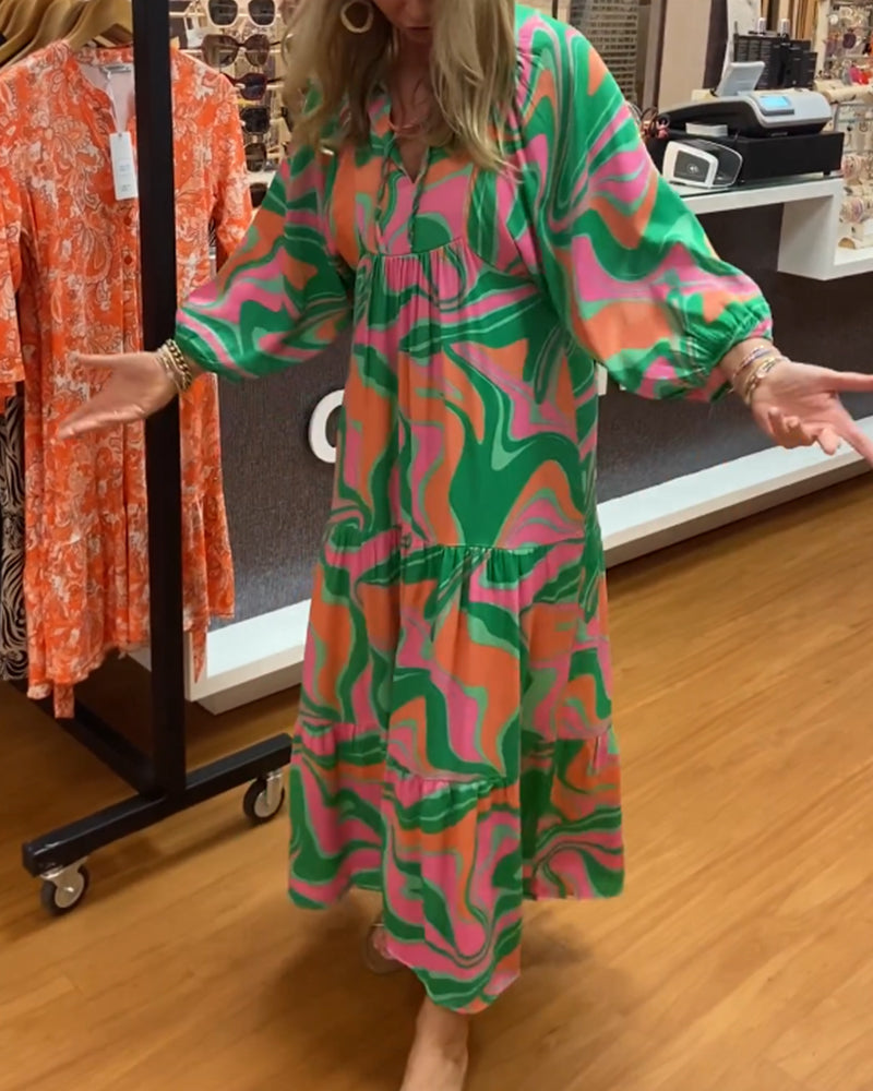 Maxiklänning med v-ringning och tryck