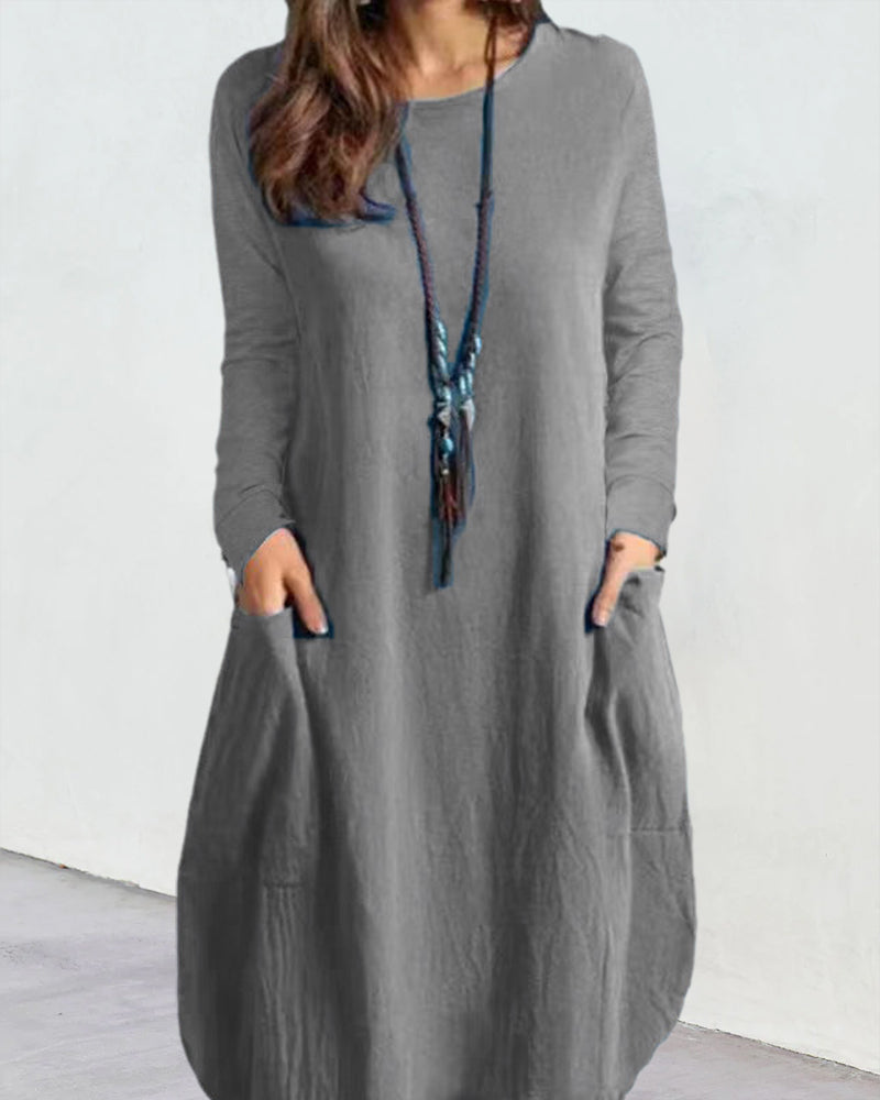 Långärmad klänning med ficka