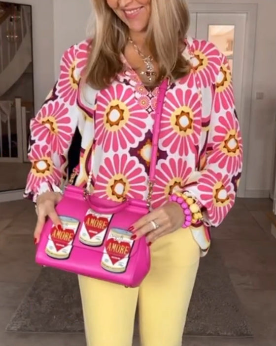 Långärmad blus med geometriskt tryck