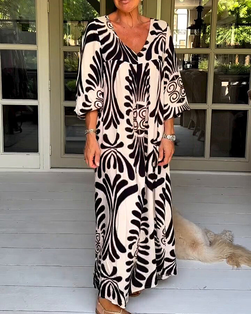 Elegant klänning med tryck