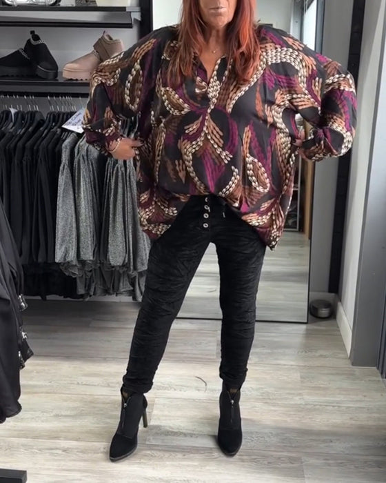 Blus med V-ringning och tryck