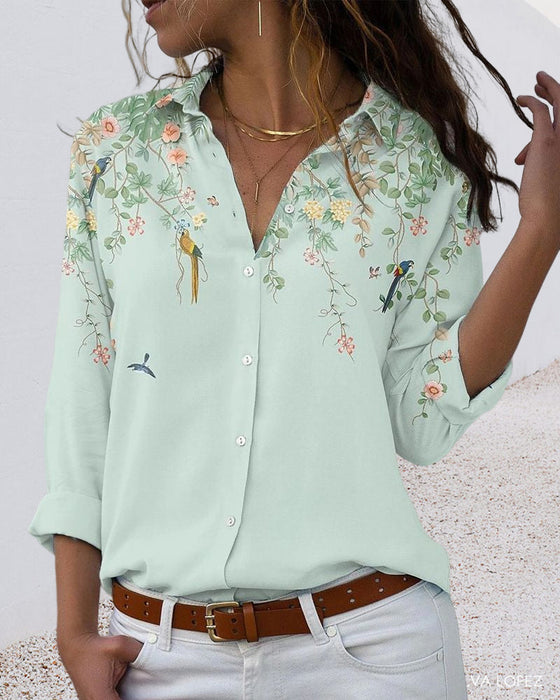 Långärmad blus med blommönster