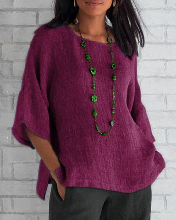 Enfärgad topp med 3/4 ärm med rund hals