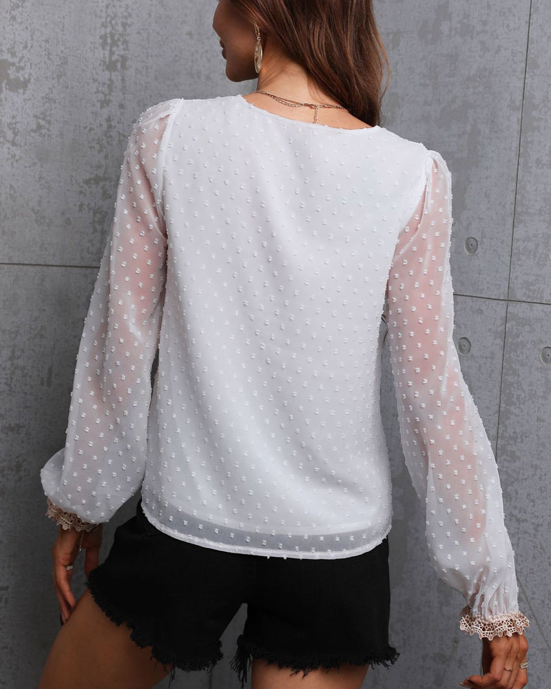 Enfärgad långärmad blusar med spets