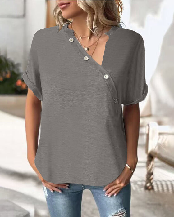 Enfärgad T-shirt med oregelbunden krage