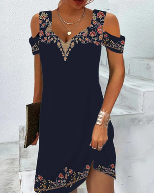 Midiklänning med tryck och kalla axlar