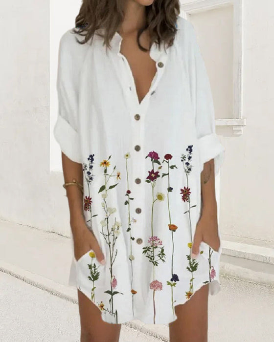 Klänning med knapptryck med lång ärm och ficka