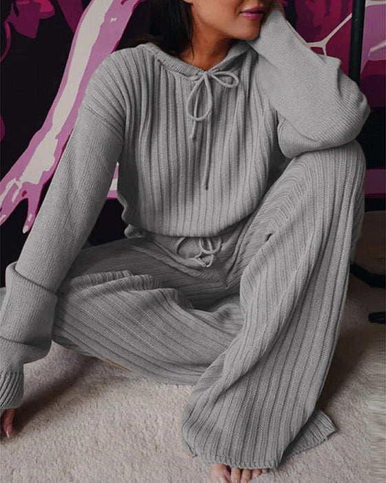 Lös långärmad kostym med huva