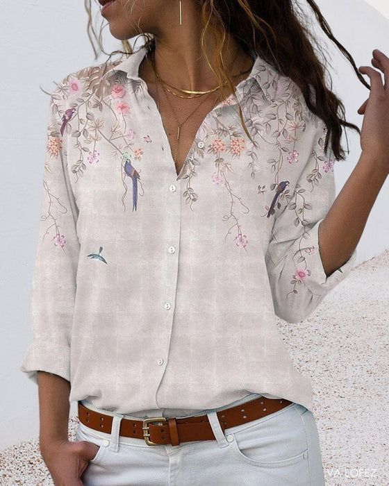 Långärmad blus med blommönster