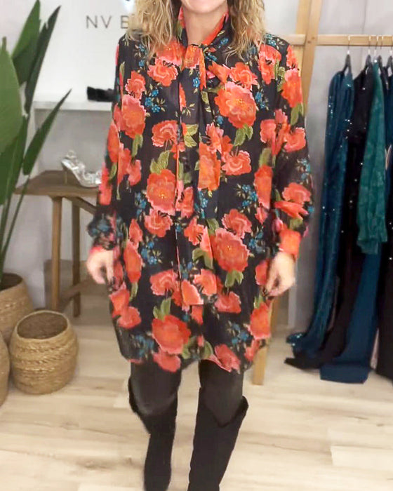 Blus med blommönster och lös passform
