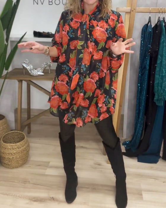 Blus med blommönster och lös passform