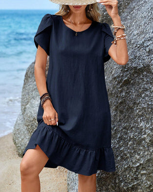 Kortärmad patchworkklänning med rund hals