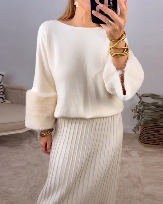 Elegant enfärgad pullover med långa ärmar