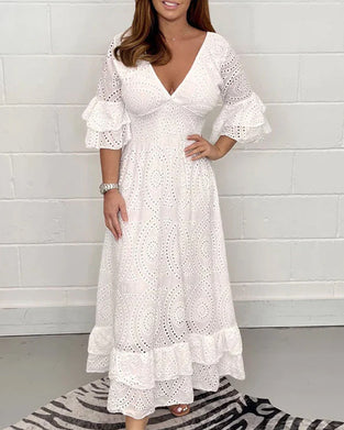 Lös v-ringad enfärgad klänning med hög midja