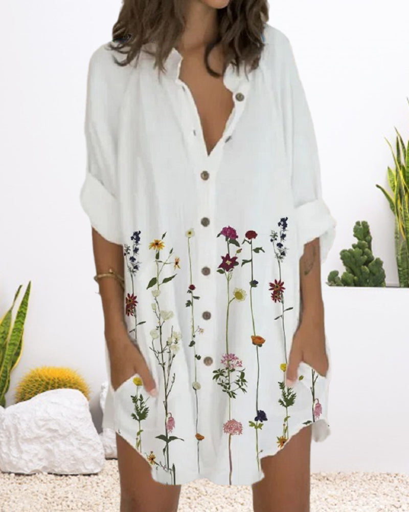 Klänning med knapptryck med lång ärm och ficka