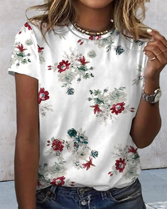 T-shirt i blommönster med rund hals och kort ärm