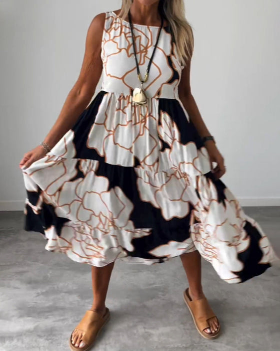 Klänning med ärmar och blommönster