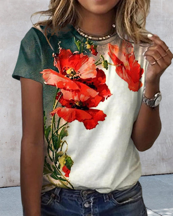 T-shirt i blommönster med rund hals och kort ärm
