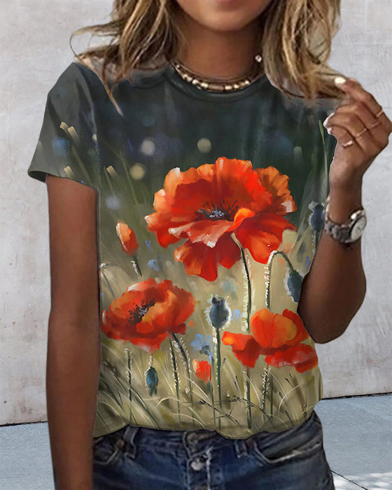 T-shirt i blommönster med rund hals och kort ärm