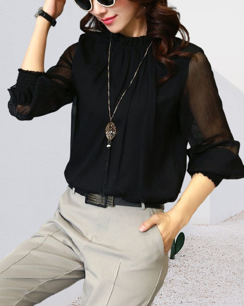 Enfärgad blus med lykthylsa