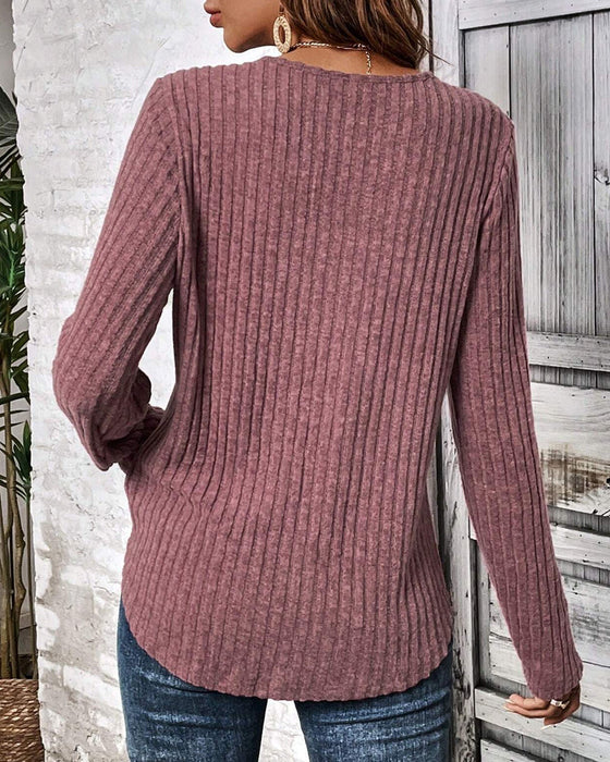 Långärmad spets i panel med rund hals