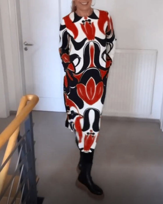 Klänning med tryck och rund halsringning