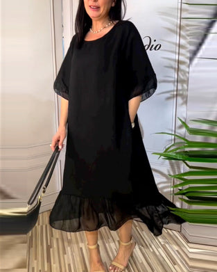 Kortärmad flödande klänning i panel