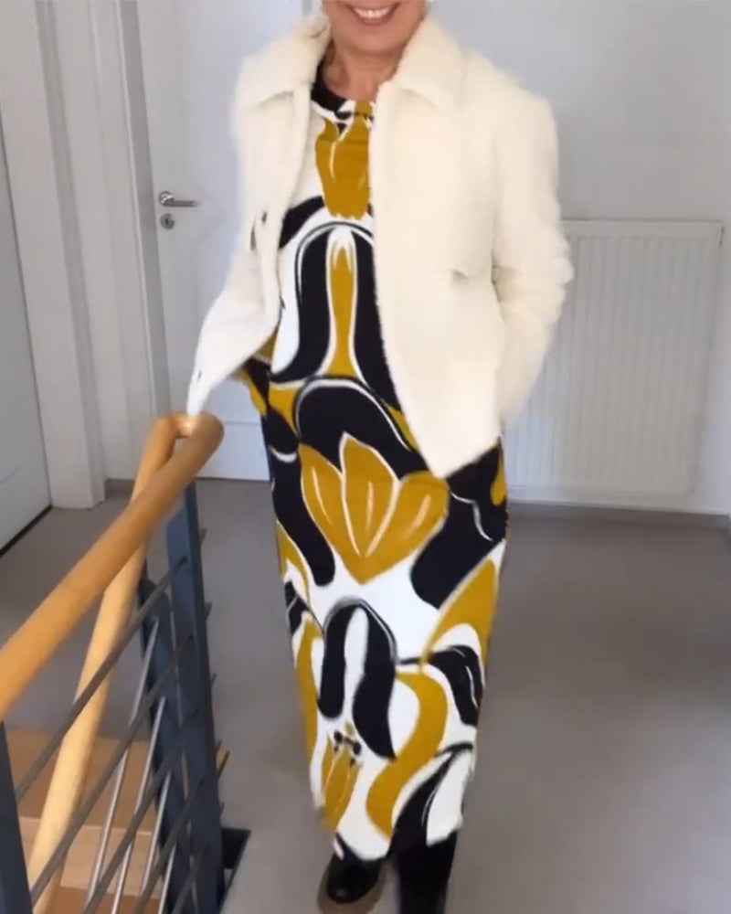 Klänning med tryck och rund halsringning