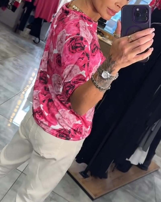 Topp med rund hals med rosa tryck