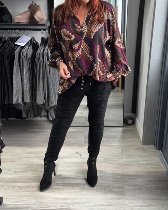 Blus med V-ringning och tryck