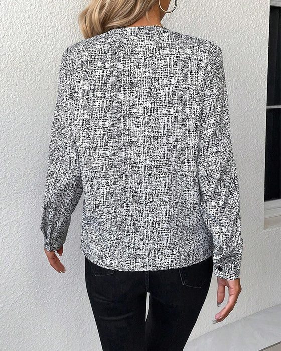 V-ringad elegant långärmad blus med tryck