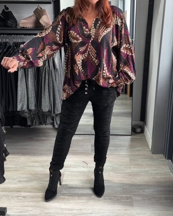 Blus med V-ringning och tryck